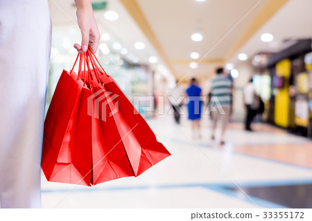 Woman with shopping bags. Woman with shopping bags. 33355172