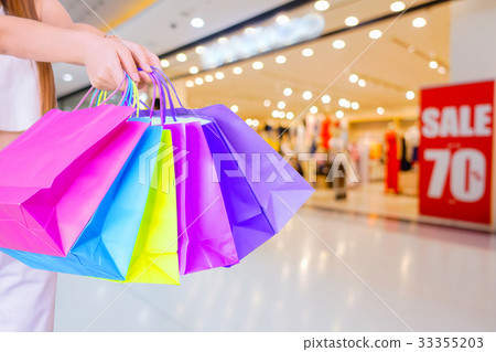 Woman with shopping bags. 33355203