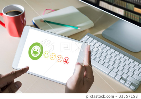 pressing smiley face emoticon The Customer Busine pressing smiley face emoticon The Customer Busine 33357158