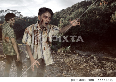 Two asian zombies with wounded face 33357240