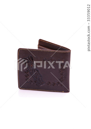 One leather purse on a white background One leather purse on a white background 33359012