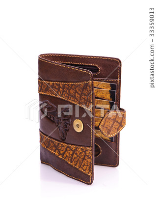 One leather purse on a white background One leather purse on a white background 33359013