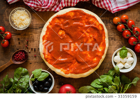 Pizza dough with tomato sauce and igredients for Pizza dough with tomato sauce and igredients for 33359159