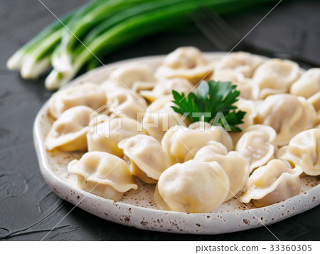 Russian pelmeni, ravioli, dumplings with meat Russian pelmeni, ravioli, dumplings with meat 33360305