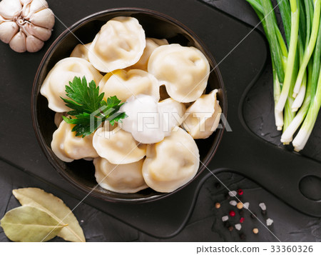 Russian pelmeni, ravioli, dumplings with meat Russian pelmeni, ravioli, dumplings with meat 33360326