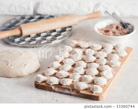 Process of making homemade pelmeni Process of making homemade pelmeni 33360744