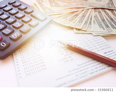 Calculator, money, statement on white background Calculator, money, statement on white background 33360811