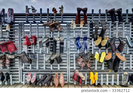 Many rubber boots  33362712