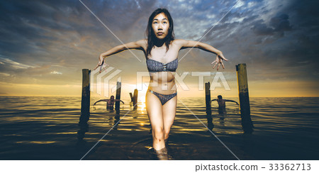 dancer water sunset 33362713