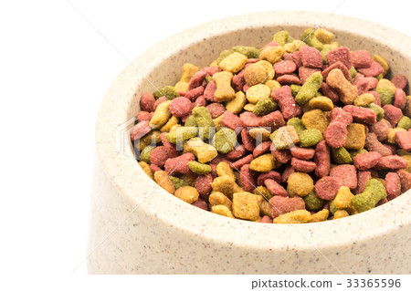 Close up of Dog food in a bowl on white background 33365596