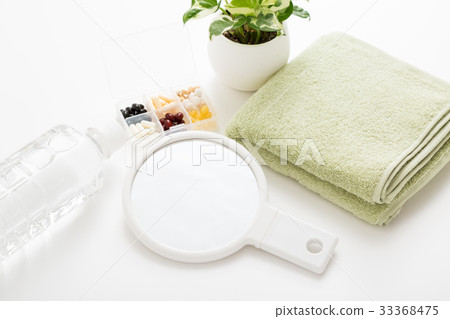 Towel and hand mirror Towel and hand mirror 33368475