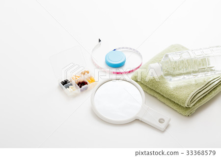 Towel and hand mirror Towel and hand mirror 33368579