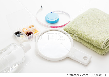 Towel and hand mirror Towel and hand mirror 33368581