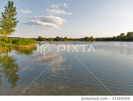 Ballast lake sunset in Voznesensk, Ukraine. Ballast lake sunset in Voznesensk, Ukraine. 33369569