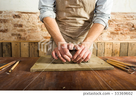 potter, workshop, ceramics art concept - close-up 33369602
