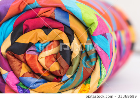 sewing, patchwork and fashion concept. An old sewing, patchwork and fashion concept. An old 33369689