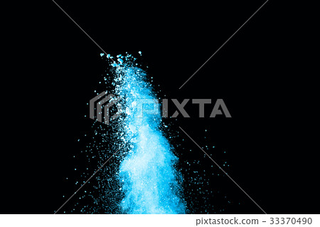 Abstract blue powder splatted on white background. Abstract blue powder splatted on white background. 33370490
