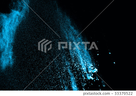 Abstract blue powder splatted on white background. 33370522