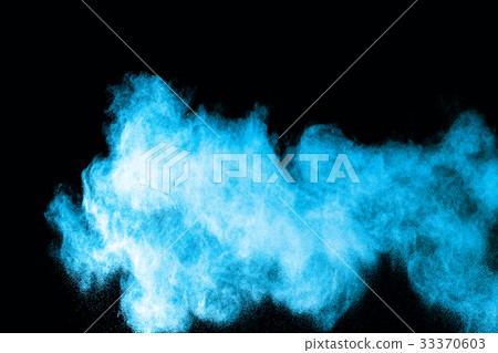 Abstract blue powder splatted on white background. Abstract blue powder splatted on white background. 33370603