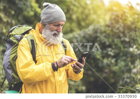 Glad old traveler looking for location with help 33370930