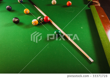 Snooker ball and stick on billiard table Snooker ball and stick on billiard table 33371728