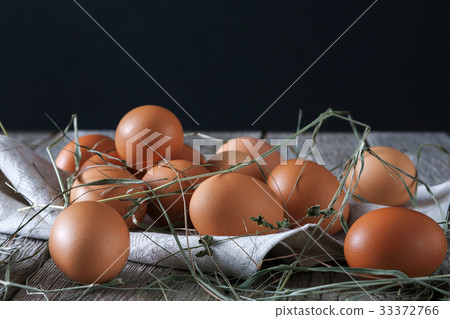 Fresh chicken brown eggs on rustic wood, organic Fresh chicken brown eggs on rustic wood, organic 33372766