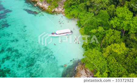 Aerial view over group of long tail boats  33372922