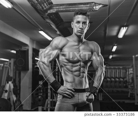 Man Lifting Heavy Weights In The Gym. Athletic sport lifestyle 33373186