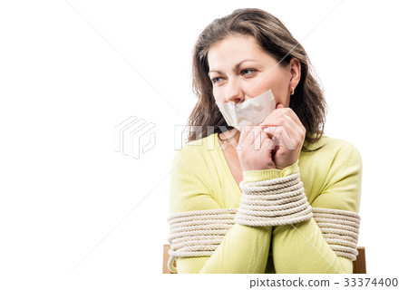 Close-up portrait of a hostage bound with a sealed 33374400