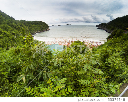 overcrowded beach in Cat Ba Island overcrowded beach in Cat Ba Island 33374546