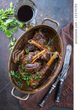 Slow Cooked Lamb Shanks in Red Wine Sauce Slow Cooked Lamb Shanks in Red Wine Sauce 33374705