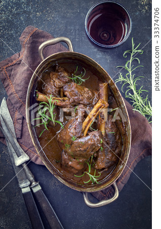 Slow Cooked Lamb Shanks in Red Wine Sauce Slow Cooked Lamb Shanks in Red Wine Sauce 33374706