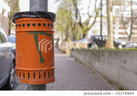 Orange basket for rubbish Orange basket for rubbish 33374944