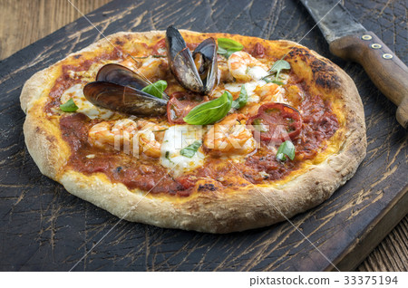 Seafood Pizza on Metal Sheet Seafood Pizza on Metal Sheet 33375194