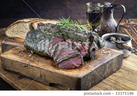 Barbecue Saddle of Venison on Cutting Board 33375196
