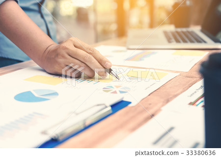 Hand business woman pointing paper data analyze 33380636