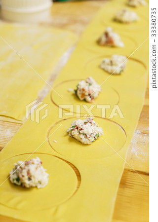 chef making ravioli 33380735