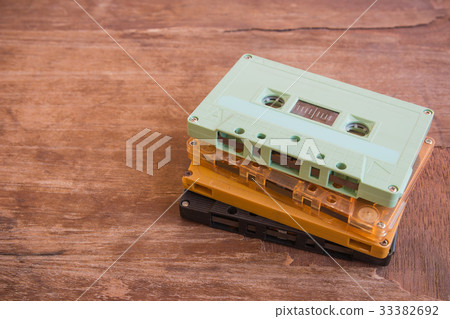 stack of cassette tape on crack and dirty wooden 33382692
