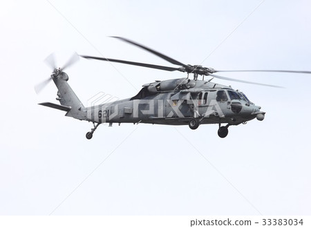 US Navy MH-60S Nighthawk utility helicopter flying in the sky 33383034