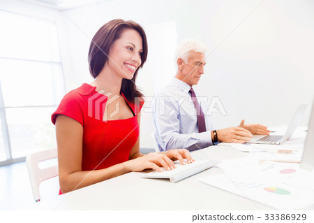 Two business collegue in office Two business collegue in office 33386929