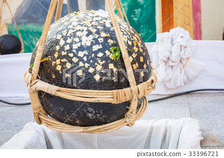 Gold foil leaf on Loknimit black inThailand temple 33396721
