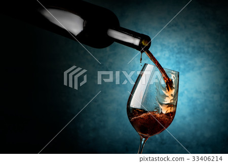 Wineglass on a blue background 33406214