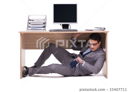 Businessman hiding in the ofice Businessman hiding in the ofice 33407711