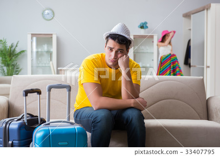 Young family preparing for travel vacation Young family preparing for travel vacation 33407795