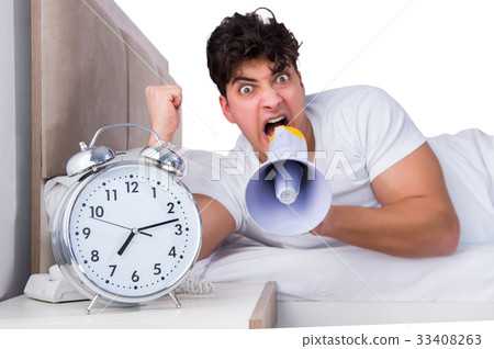 Man in bed suffering from insomnia Man in bed suffering from insomnia 33408263