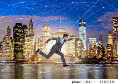 Businessman running in internet of things concept Businessman running in internet of things concept 33408449