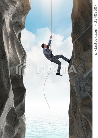 Businessman overcoming challenges in business 33408607