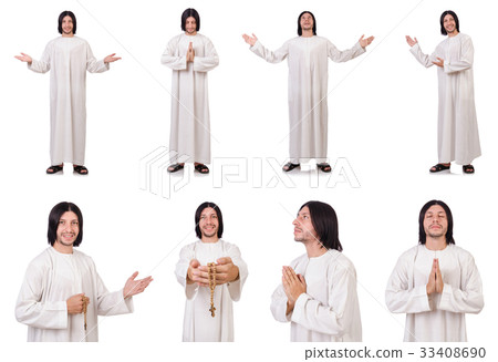 Young priest with bible isolated on white 33408690