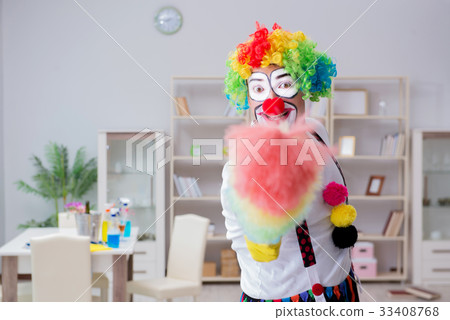 Funny clown doing cleaning at home Funny clown doing cleaning at home 33408768