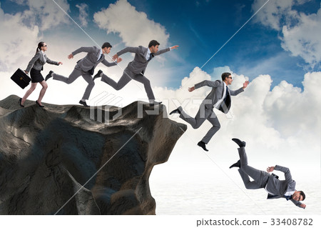 Business people falling off the cliff 33408782